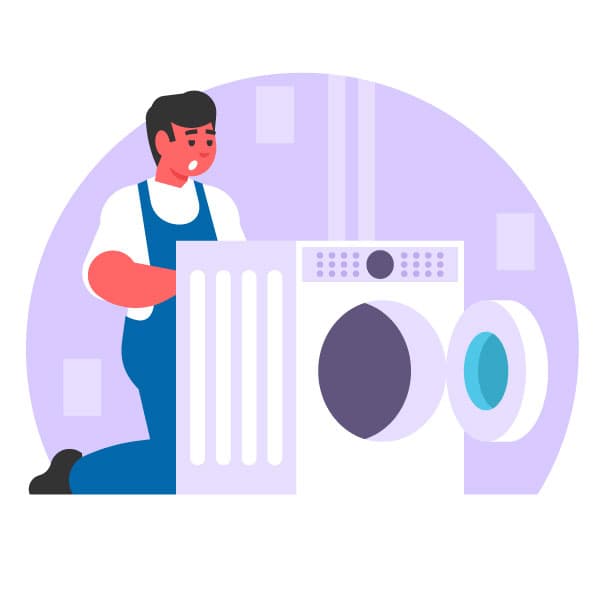 Worker repairing a washing machine