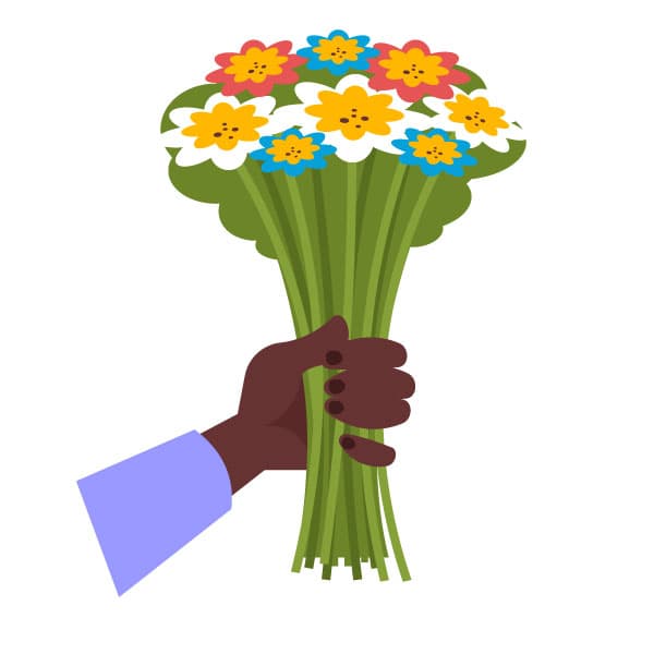 Mano nera che tiene i fiori